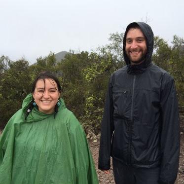 2 EES students in the rain on a field trip to an outdoor location