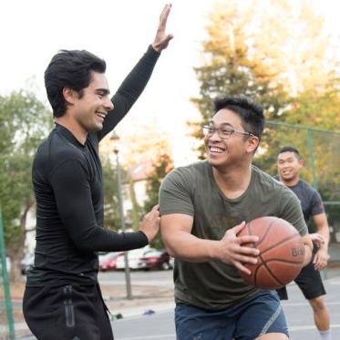 Students playing basketball